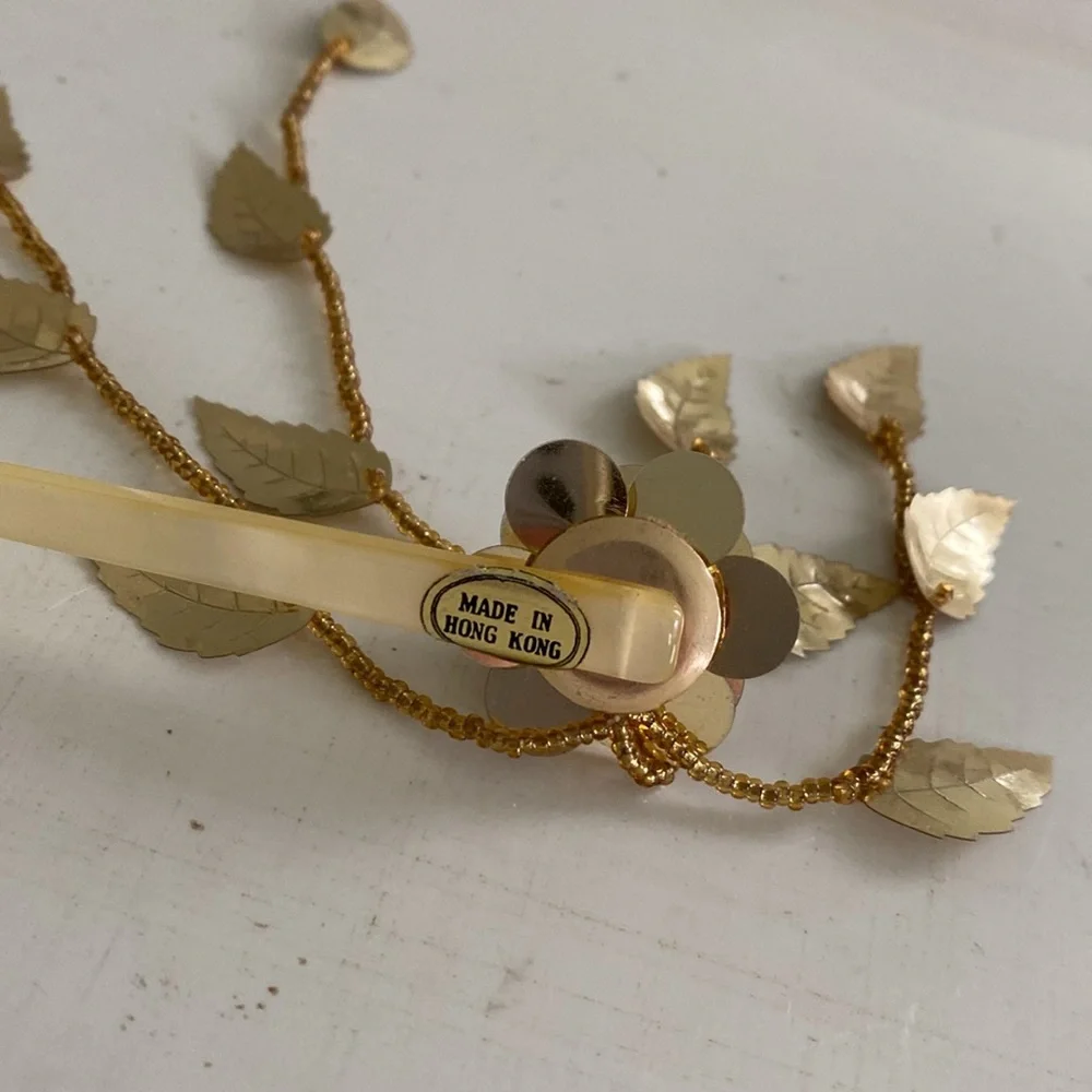 Vintage Gold Flower Hair Stick Pin with Gold Leaf Tassels. Made in Hong Kong